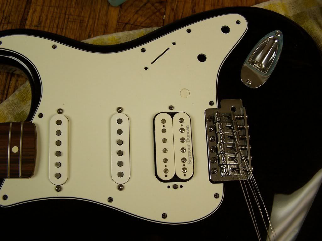 How to fit a regular humbucker in an original HSS Fender Pickguard
